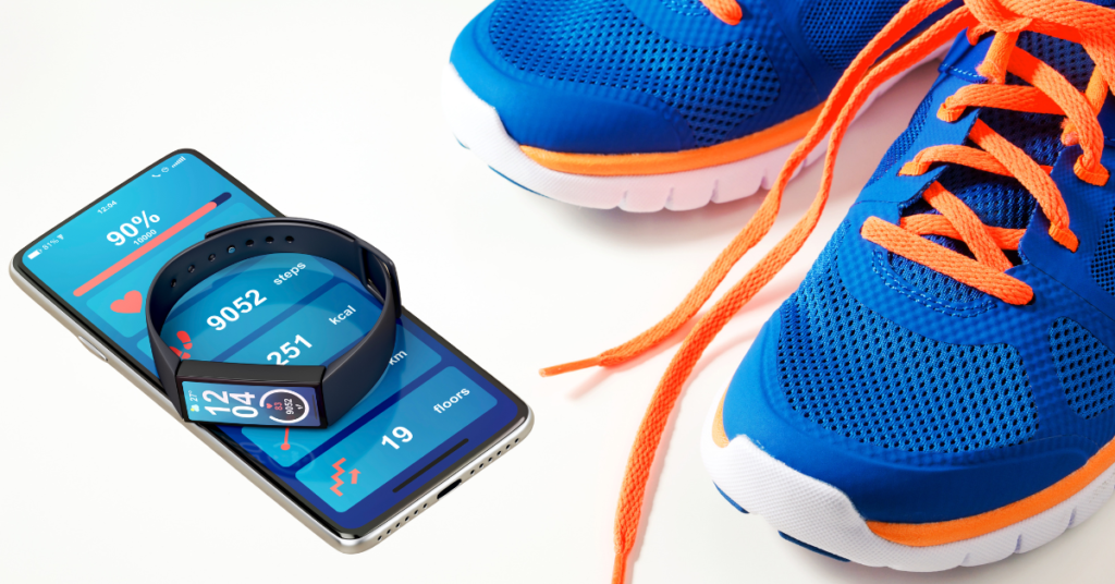 image of fitness tracking wristband, mobile phone, and running shoes